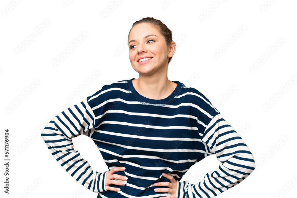 Young blonde woman over isolated chroma key background posing with arms at hip and smiling Young blonde woman over isolated chroma key background posing with arms at hip and smiling