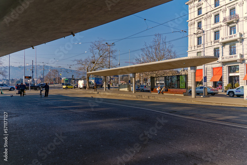 Tram station with waiting passengers at Bellevue Square at City of Z  rich on a sunny winter day. Photo taken February 9th  2023  Zurich  Switzerland.
