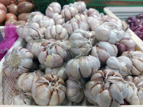 Pile of garlic cloves for sale at traditional market