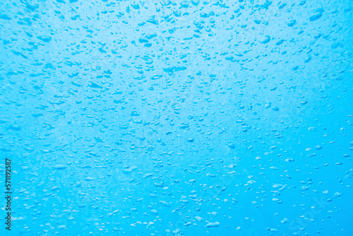 County bubbles in blue water, texture