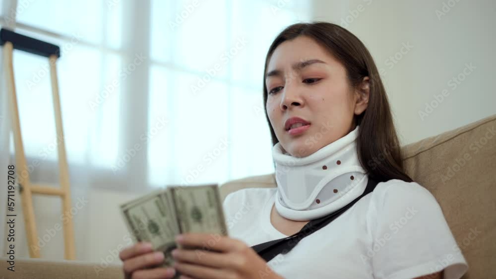 Video „Woman stressed over medical expenses money from accident fracture broken bone injury with