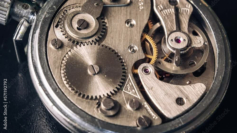 Timelapse of mechanism of vintage stopwatch with rotation closeup