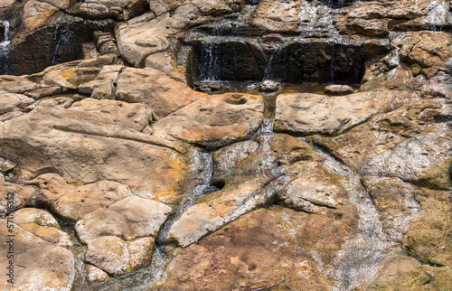 Detail of the Fuente de Lavapatas, ceremonial fountain with numerous serpentine and batracomorphic figures in low relief. San Agustin (San Agustín), Huila, Colombia, archaeological park. photo