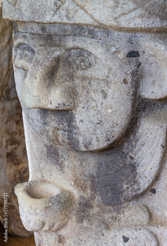 San Agustin (San Agustín), Huila, Colombia : pre-columbian megalithic sculptures in the archaeological park. Impressive megaliths carved with volcanic stone. Gardians of the dead resting in the tomb. photo