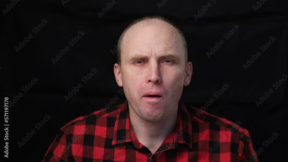 A man bites a red apple A man bites a red apple
