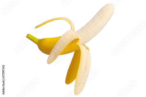 Fresh raw yellow banana peeled open in flight isolated.