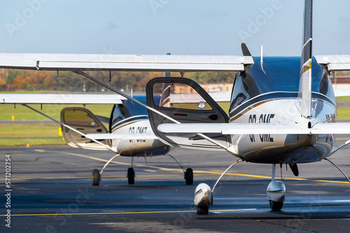 Two small planes prepare to flight on airport.