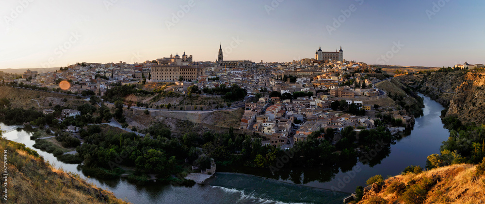 Panoramic view of Toledo at sunset. Toledo is a city and municipality of Spain, capital of the province in the autonomous community of Castilla–La Mancha. Toledo was declared a World Heritage Site.