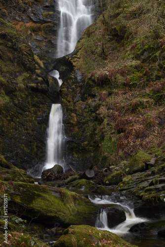 the tall Pistyll Rhaeadr waterfall in north wales from the bottom of it	
