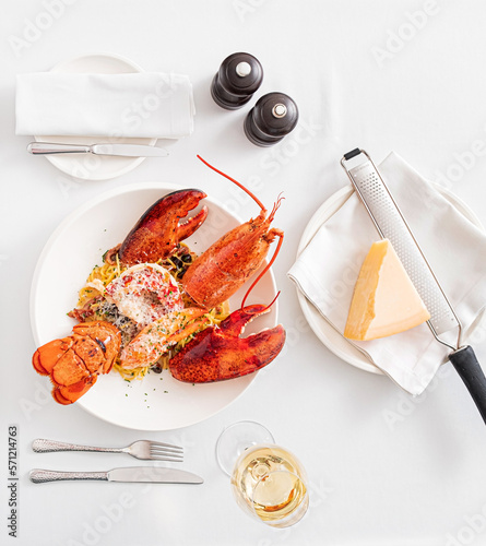 Seafood feast, Lemon and fresh Boston lobster photo