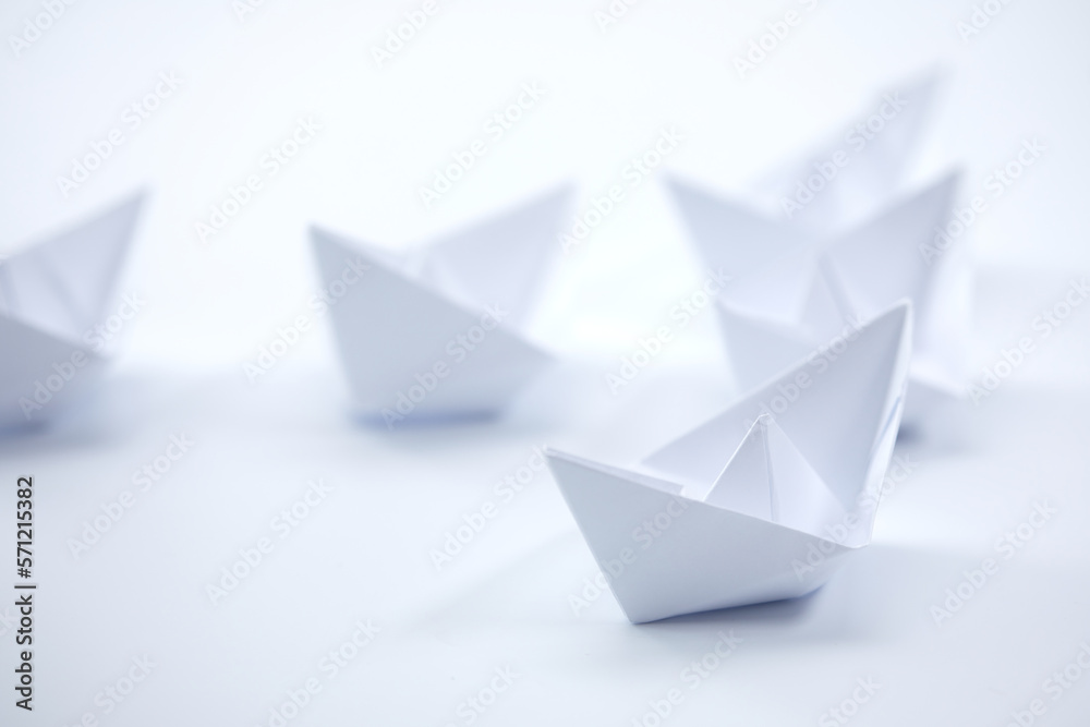 paper boats on the documents paper boats on the documents