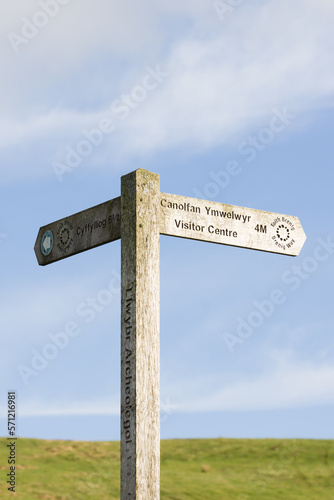 Walking sign post on the Brenig Way archaeological trail at Llyn Brenig reservoir in the Denbigh moors in Wales allowing visitors locate bronze age monuments in the area 