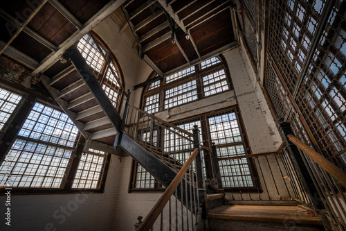 Interior stairwell of an abandoned hospital prison