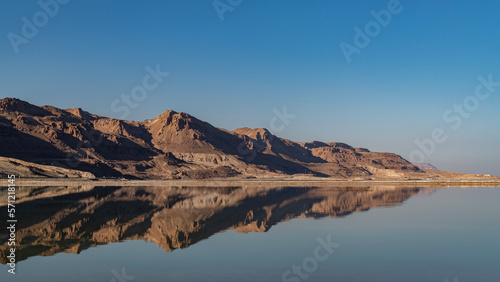 The beautiful Judean desert mountains reflected in the Dead Sea at Ein Bokek  Israel. 