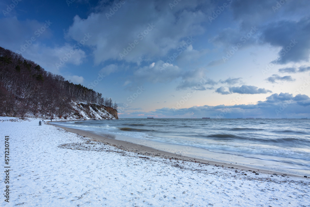 Beautiful landscape of the cliff in Gdynia Orłowo in snowy winter, Baltic Sea. Poland