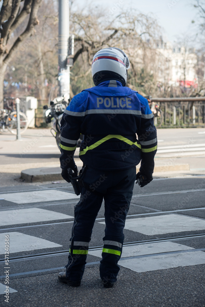 Strasbourg - France - 11 February 2023 - Portrait of french national policeman and motorbike in the street