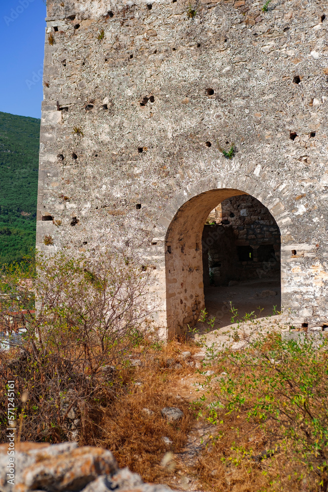 ancient ruins in Greece, roman empire architecture, the venetian castle of Parga, stone old walls with wild plants