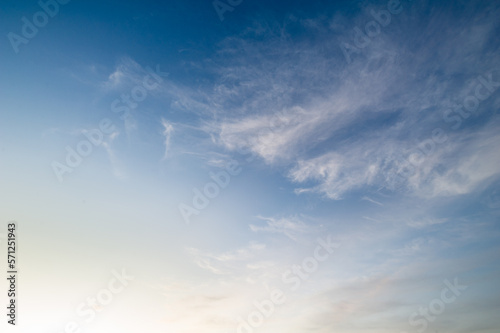 blue sky and fluffy soft white cloud background and texture, concept for freedom and bright ozone air, design for backdrop and nature wallpaper 