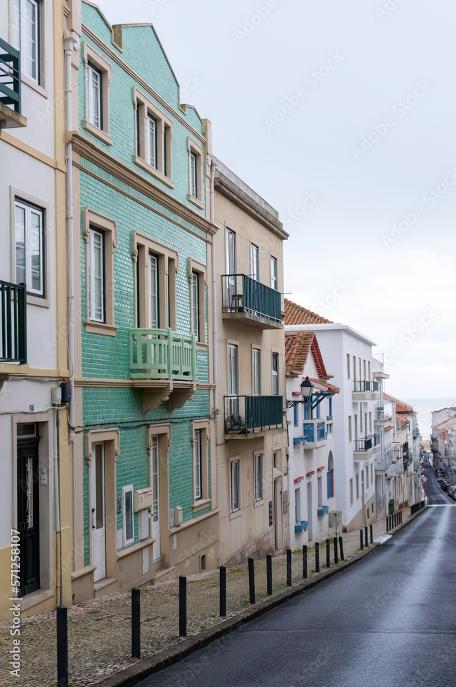 An empty old street leading to the ocean, in the historic center of the Nazare