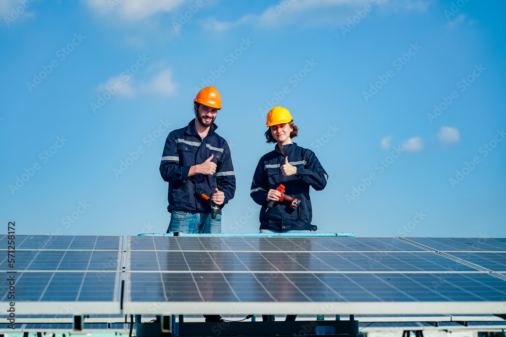Technology solar cell, Engineer service check installation solar cell on the roof of factory. technician checks the maintenance of the solar panels Technology solar cell, Engineer service check installation solar cell on the roof of factory. technician checks the maintenance of the solar panels