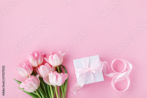 Spring flowers, gift box and number 8 for Happy Women Day. Greeting card in pink colors.