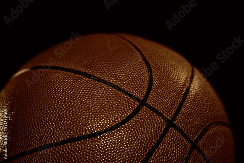 Basketball ball close up on dark background selective focus