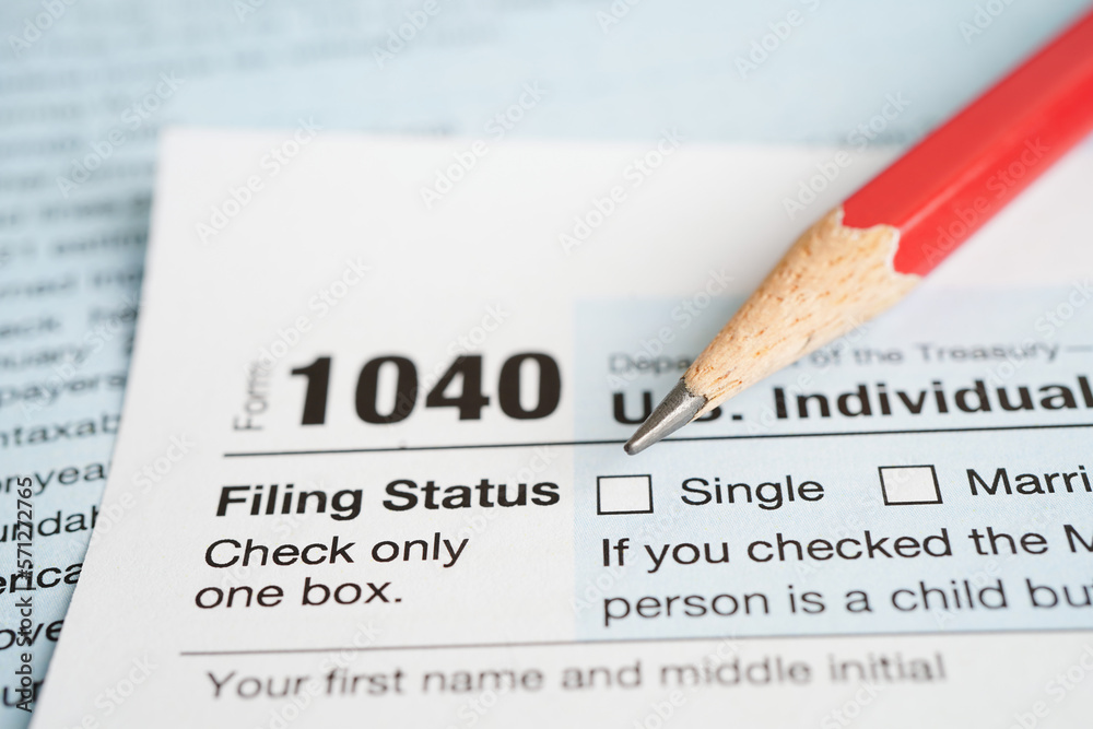 Tax form 1040 U.S. Individual Income Tax Return, business finance concept. Tax form 1040 U.S. Individual Income Tax Return, business finance concept.
