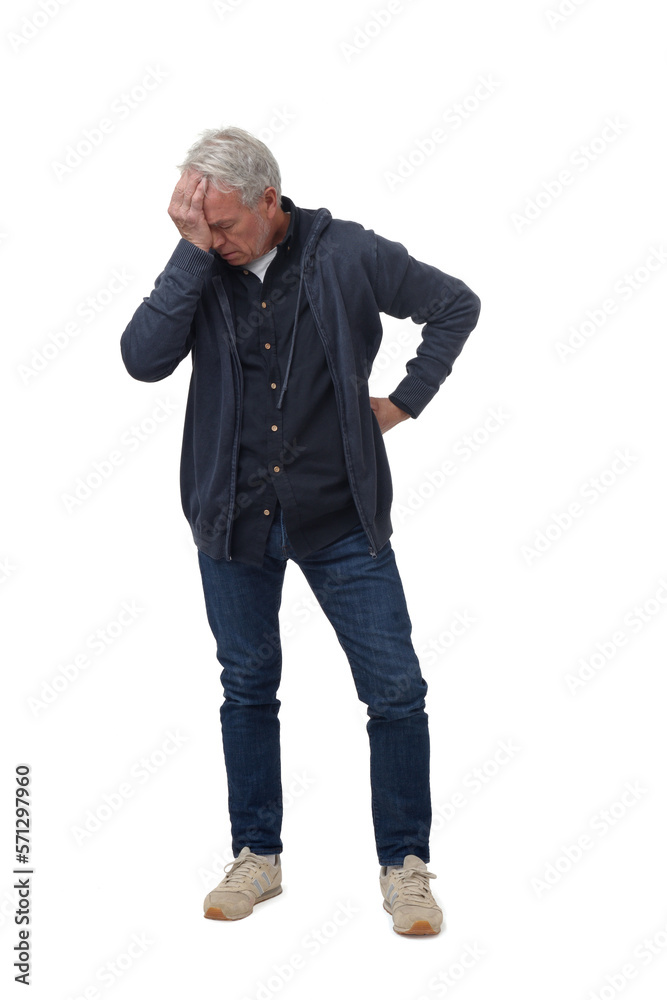 full length portrait of a man in headache pain isolated on white full length portrait of a man in headache pain isolated on white