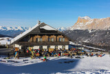 Skiers in the Dolomites, ski season, italian mountains, winter, sun in the mountains, rest in the mountains. Pralongia.