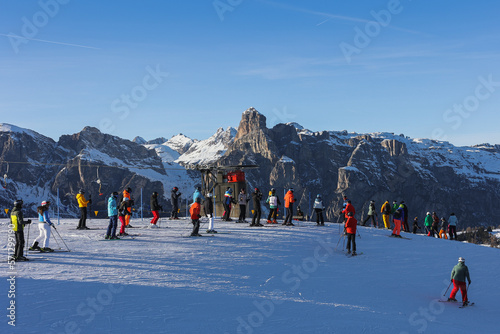 Skiers in the Dolomites, ski season, italian mountains, winter, sun in the mountains, rest in the mountains.