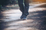 foot of woman Traveler with backpack relaxing outdoor with rocky mountains on background Summer vacations and Lifestyle hiking concept.