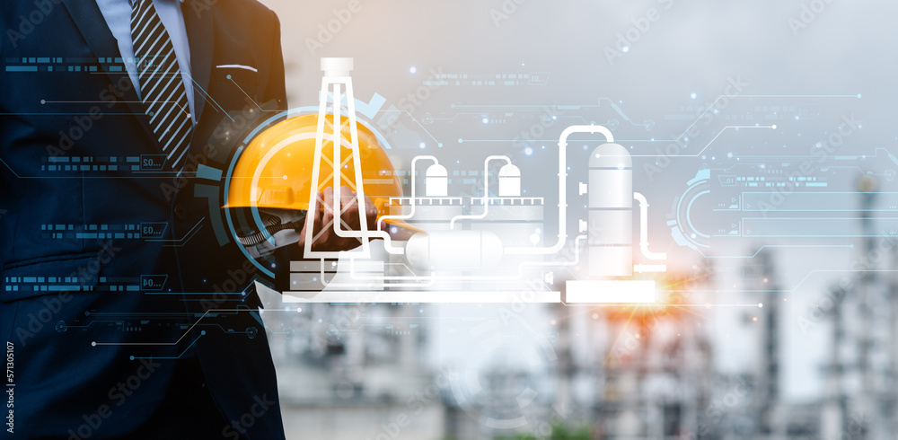 Refinery Project Manager Picture Examples Engineer and architect supervising work inside a large oil refinery, he ...
