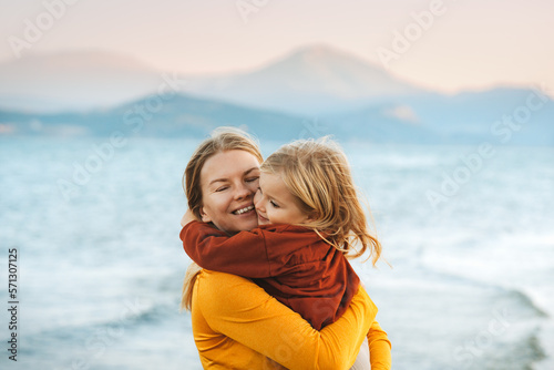 Mother hugging with child daughter family lifestyle happy emotions travel togeth Fototapet