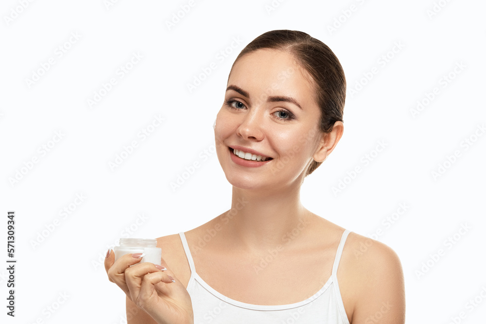 Beauty skin woman natural makeup face cosmetic concept.Beautiful portrait of female face holding and applying cosmetic cream. Skin care. Beauty skin woman natural makeup face cosmetic concept.Beautiful portrait of female face holding and applying cosmetic cream. Skin care.