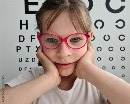 Child an ophthalmologist .Portrait of a girl at ophthalmologist