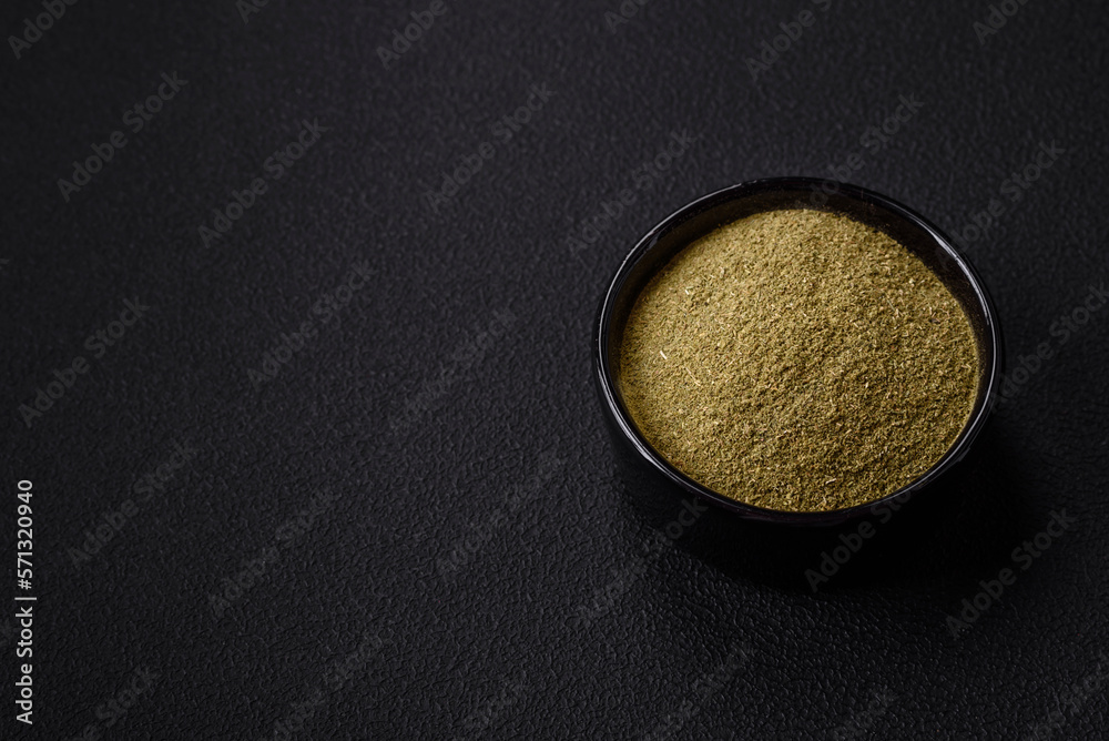 Spice dried dill or basil in the form of green powder Spice dried dill or basil in the form of green powder