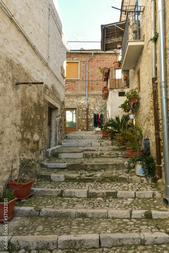 A narrow street between the old houses of Bovino  an ancient town in Puglia  Italy.