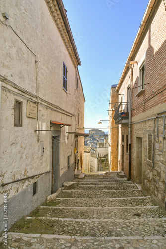 A narrow street between the old houses of Bovino, an ancient town in Puglia, Italy. © Giambattista