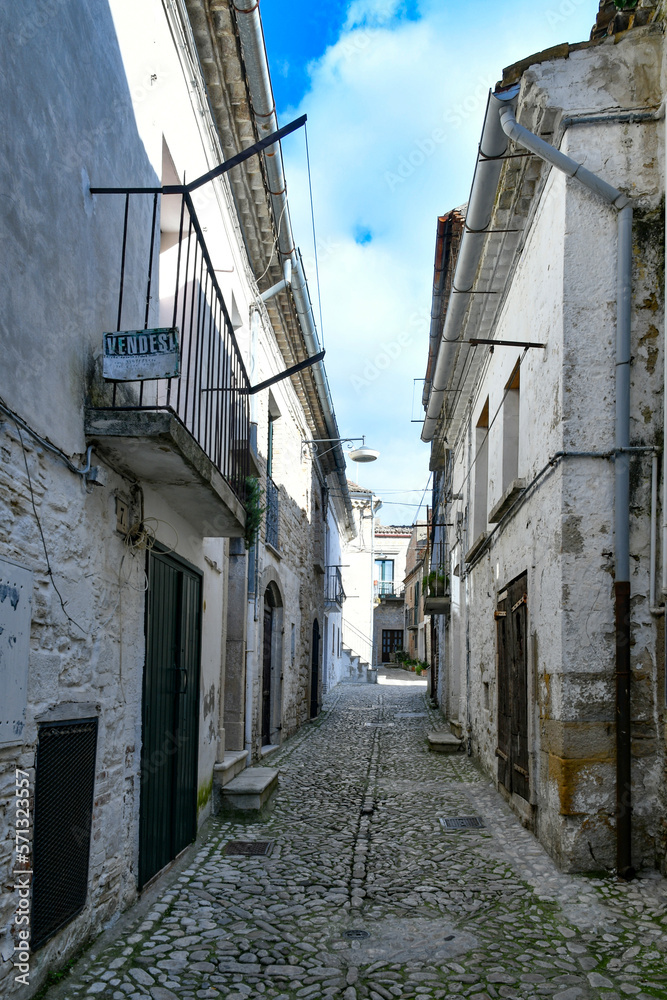 A narrow street between the old houses of Bovino, an ancient town in Puglia, Italy. A narrow street between the old houses of Bovino, an ancient town in Puglia, Italy.