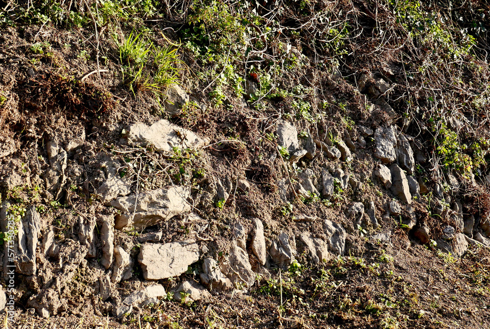 Abandoned stone wall in a mountainous countryside area Abandoned stone wall in a mountainous countryside area