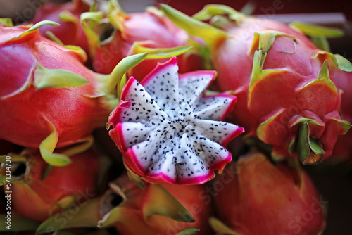 Fancy Cut Dragon Fruit Displayed at Farmer's Market Sale photo