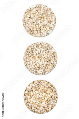 Three rice cakes on a white isolated background. Crispy rice diet product for a healthy lifestyle. Delicious low calorie snack on white background
