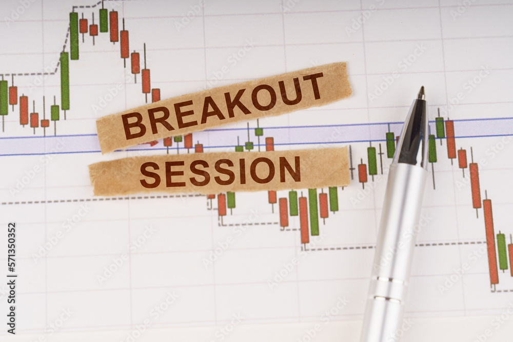 On the chart of business quotes lies a pen and torn paper with the inscription - Breakout Session On the chart of business quotes lies a pen and torn paper with the inscription - Breakout Session