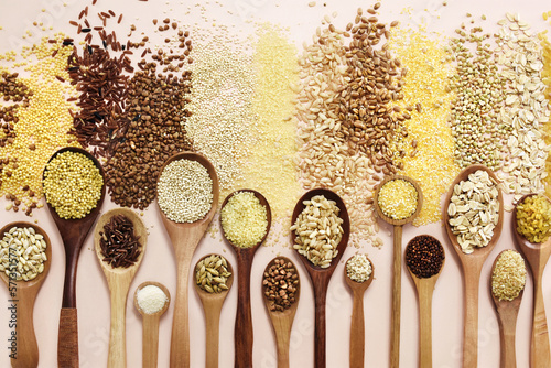 Colorful mix of grain varieties: oat and wheat, rice and millet, buckwheat and barley, quinoa and polenta. Food ingridients background	 photo
