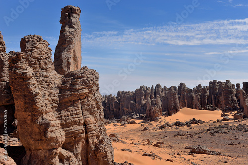 SAHARA DESERT, SAND DUNES AND ROCK FORMATIONS DURING JEEP SAFARI IN ALGERIA AROUND DJANET OASIS AND ERG ADMAR