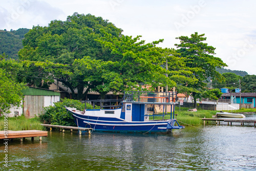 FLORIANOPOLIS, BRAZIL - JANUARY 21, 2023 : boats on the Canal at Barra da Lagoa area of Lagoa da Conceicao