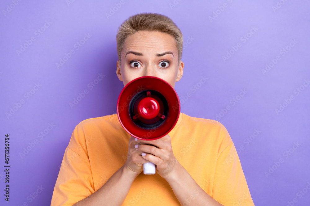 Fototapeta premium Photo of worried young girl arms hold loudspeaker talk communicate isolated on violet color background