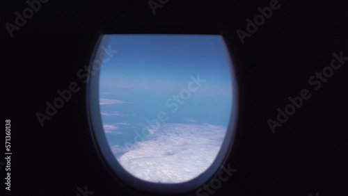 View through airplane window of the beautiful clouds