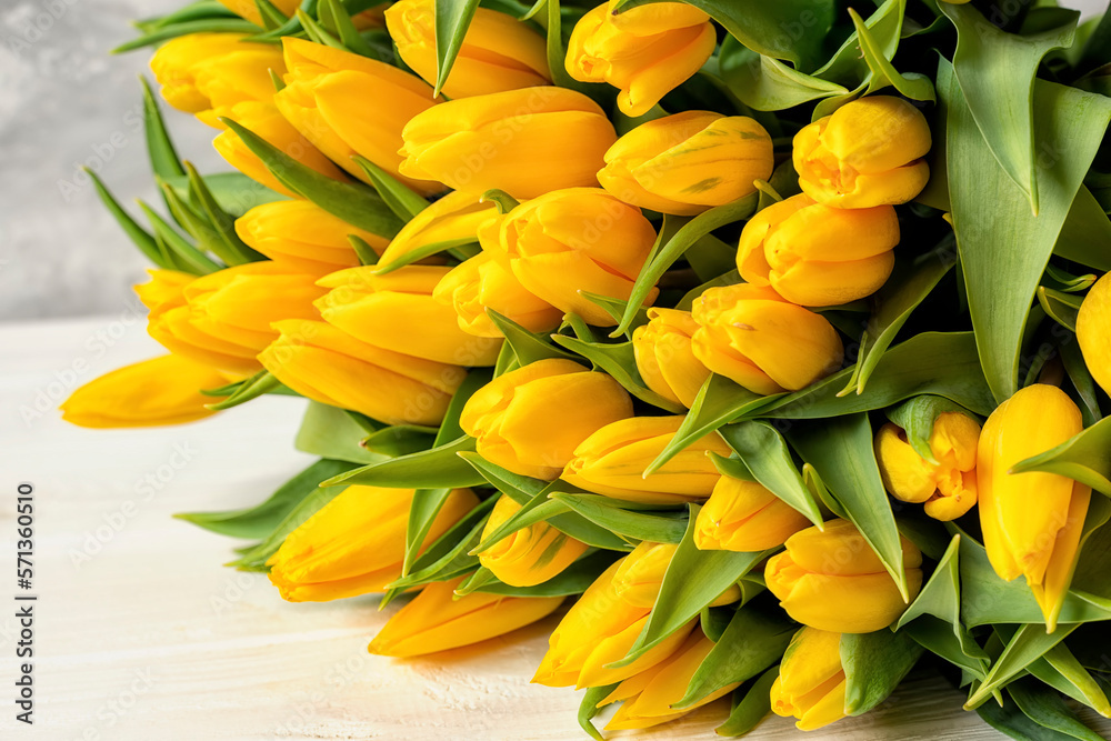 Bouquet of yellow tulips on a light background
Bouquet of yellow tulips on a light background