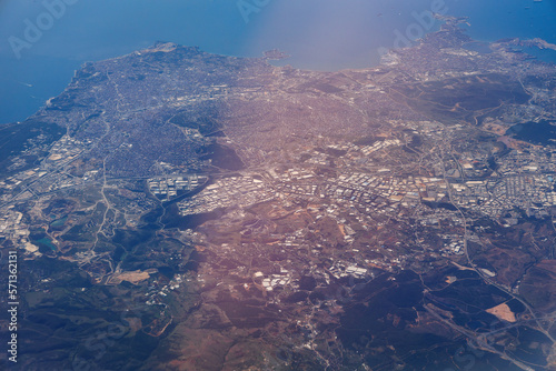 Aerial view from plane window with areas of Istanbul city and Gebze city on the shore of Marmara Sea, Turkey